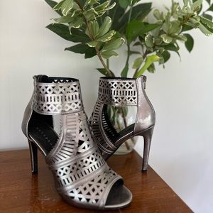 Silver, heeled sandal with laser cut designs